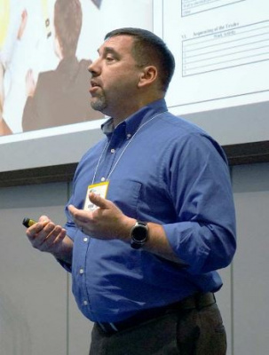 Brian Sroik speaking during a presentation