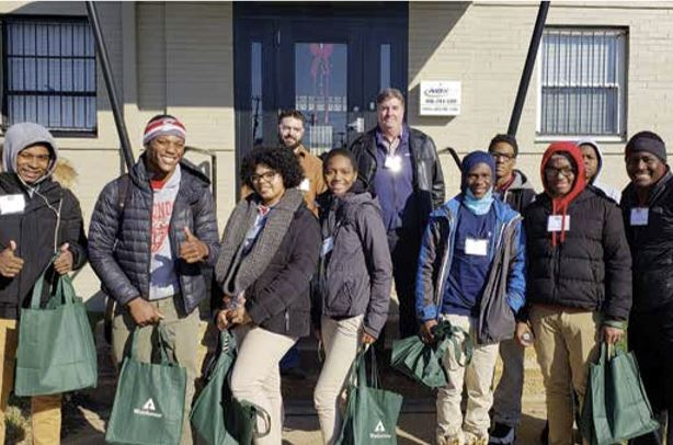 Group of tech students from Edmondson Westside High School standing outside